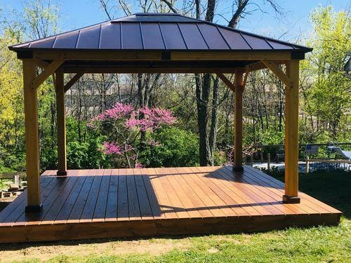 Customer photo review of SUNJOY 11x13 Wooden Gazebo with Solar Panel, LED Lights and Ceiling Hook - Driftwood Cedar