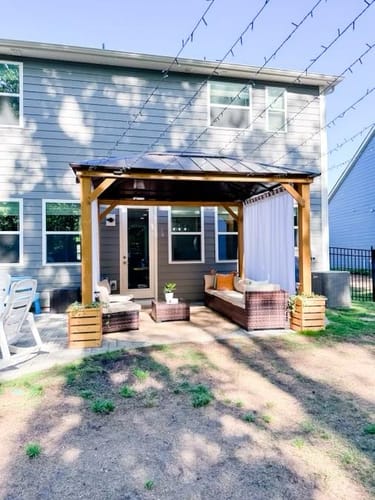 Customer photo review of SUNJOY 11x13 Wooden Gazebo with Solar Panel, LED Lights and Ceiling Hook - Driftwood Cedar