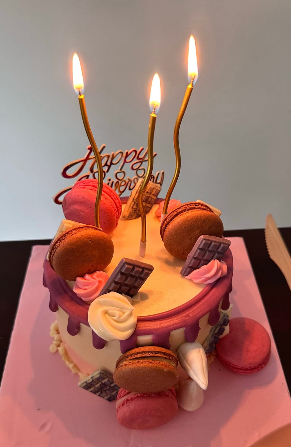 Customer photo review of Purple Drip Macaron Cake