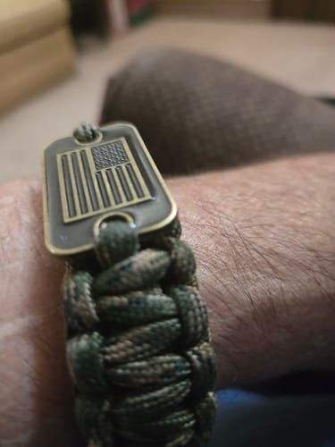 Customer photo review of Camo Paracord Bronze Flag Bracelet- Helps Pair Veterans With A Companion Dog