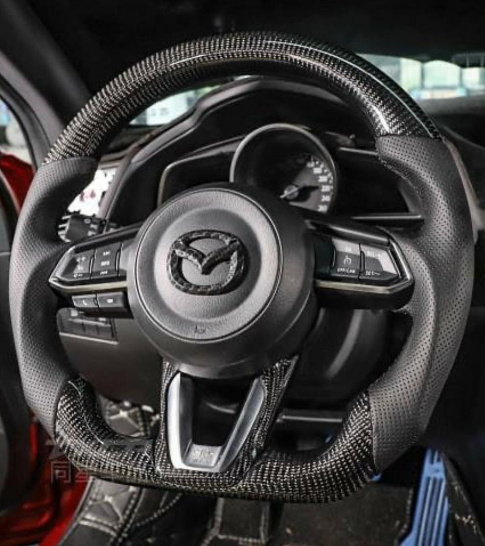 Customer photo review of 2014-2018 Mazda 3 Custom Carbon Fiber Steering Wheel