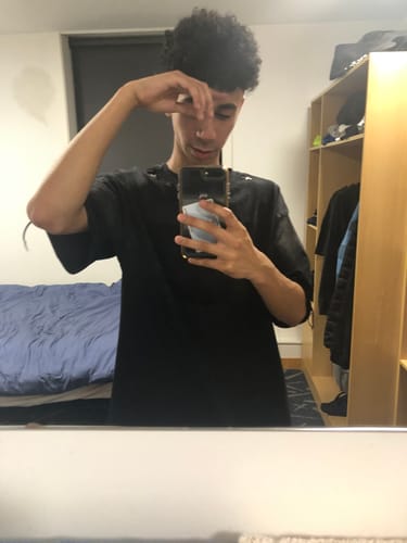 Customer photo review of NEV Metallic Four-Pointed Star Ripped Tee