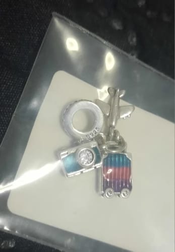 Customer photo review of 925 Sterling Silver Happy Travel Charm