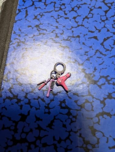 J. E. review of 925 Sterling Silver Hairdryer Comb and Curler Charm image 1 out of 1