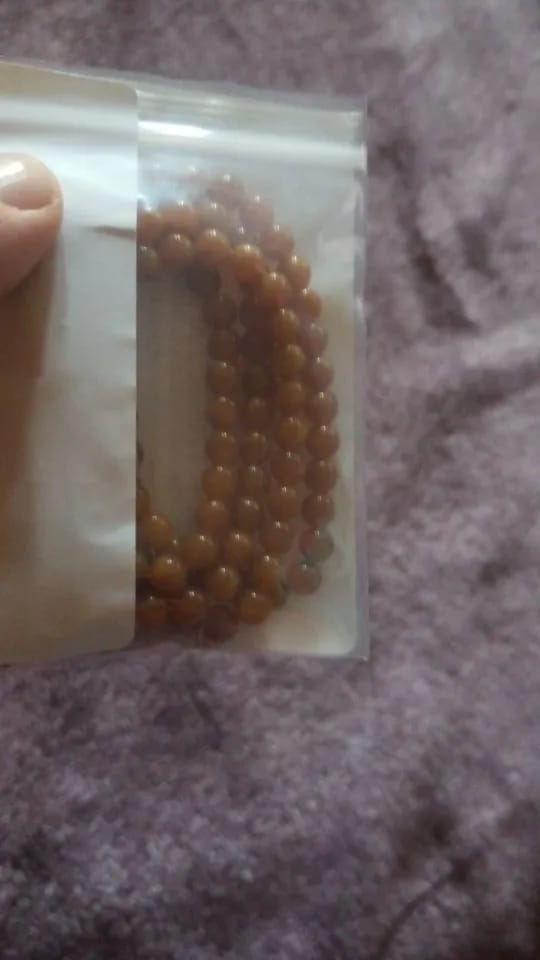 Customer photo review of Beeswax Amber Circle Necklace 108 Beads — Honey Gold | KIMLUD