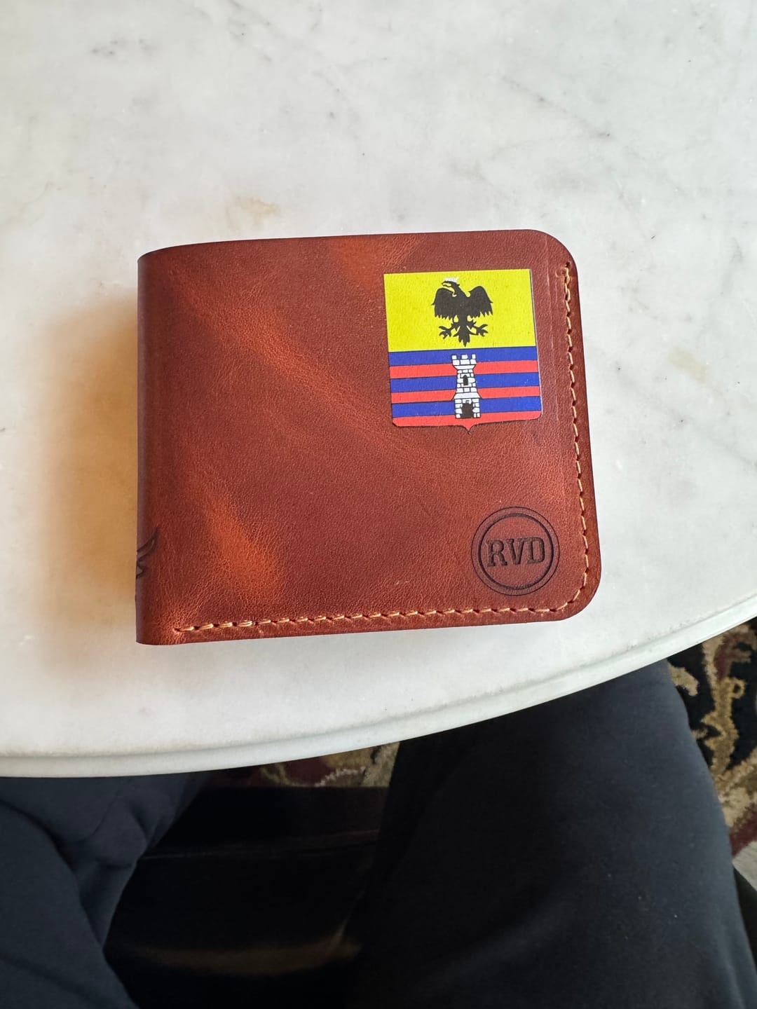 Customer photo review of Badge Bifold Wallet