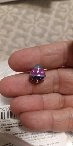 Customer photo review of 925 Sterling Silver Glow in the Dark Spaceship Charm
