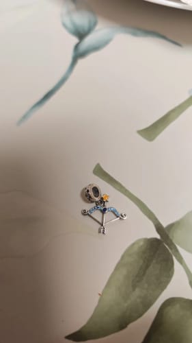 Customer photo review of 925 Sterling Silver Glow in the Dark Sagittarius Charm