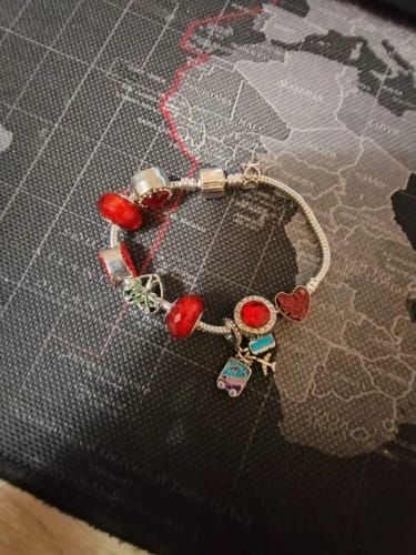 Customer photo review of 925 Sterling Silver Happy Travel Charm