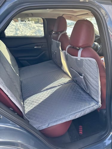 Customer photo review of NEW Waterproof Hard Bottom Car & Truck Seat Foldable Hammock Cover With Storage Pockets, Side Flaps, Headrest Straps, Seat Anchors, & Mesh Window (+FREE SAFETY BELT!)