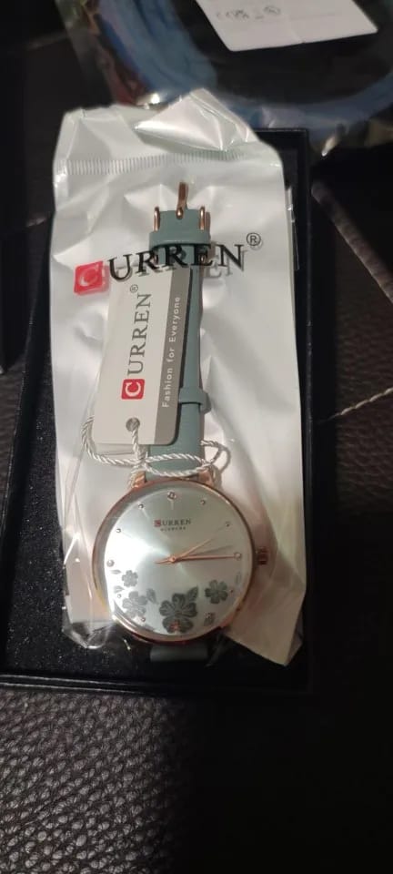Customer photo review of Leather Quartz Wristwatch Floral Dial — Light Blue | KIMLUD