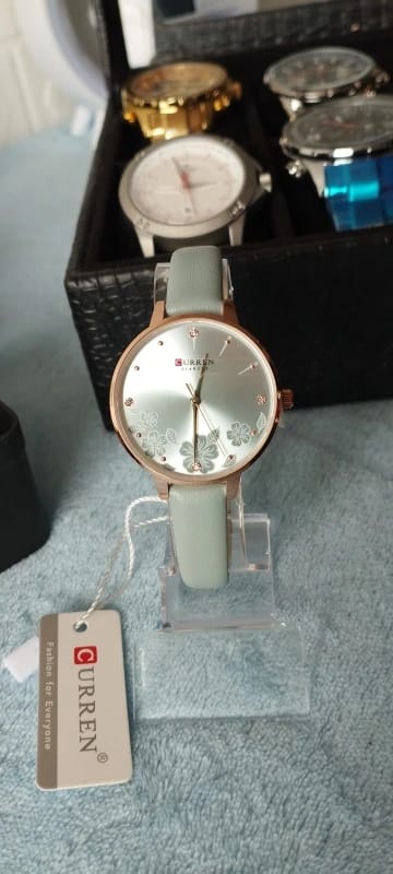 Customer photo review of Leather Quartz Wristwatch Floral Dial — Light Blue | KIMLUD