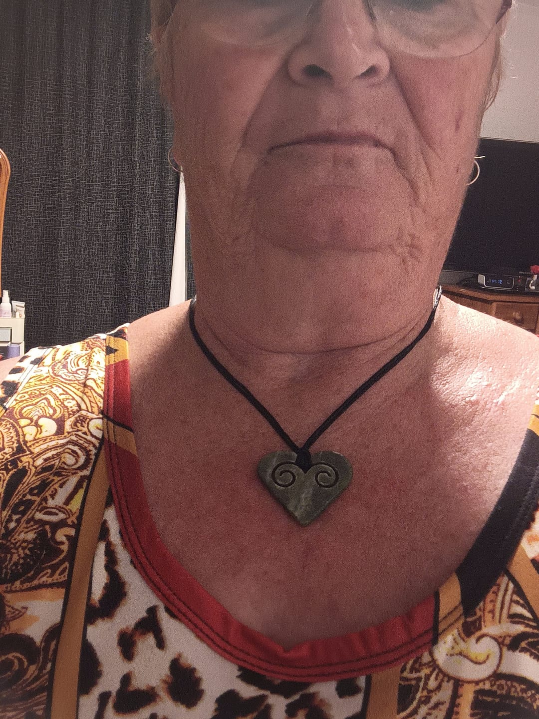 Customer photo review of Genuine NZ Greenstone Heart Necklace with Two Inner Koru
