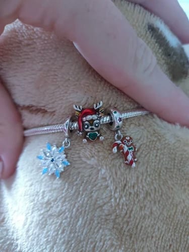 Customer photo review of 925 Sterling Silver Baby Reindeer Charm