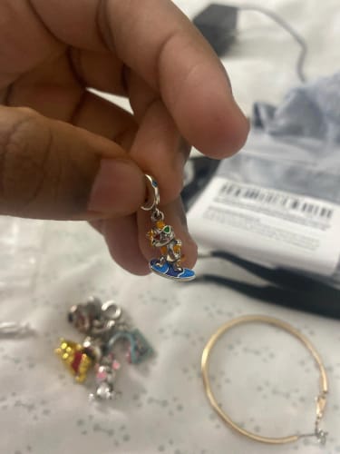 Customer photo review of 925 Sterling Silver Surfing Cat Charm