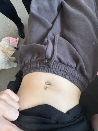 Customer photo review of Titanium Heart Solitaire Belly Rings