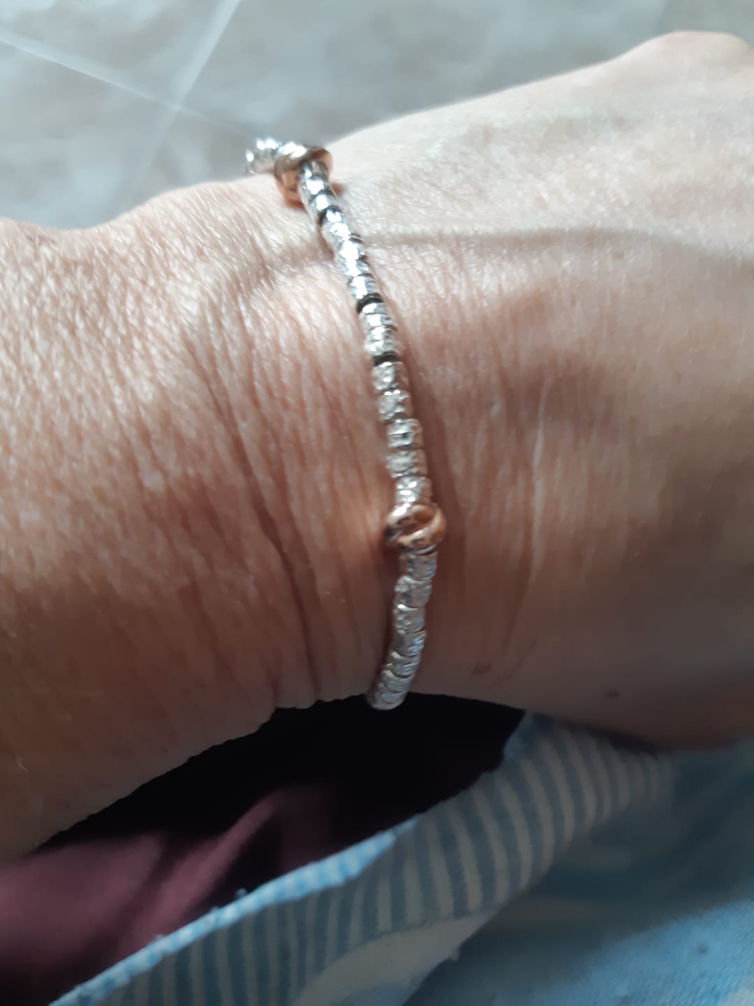 Customer photo review of Bracciale Granelli e Nodini Rosa