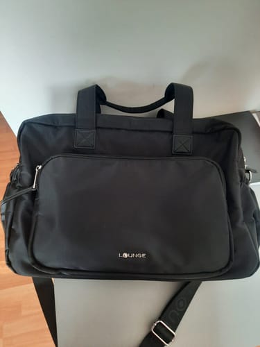 Reseña con foto de un cliente sobre Bolso Maternal