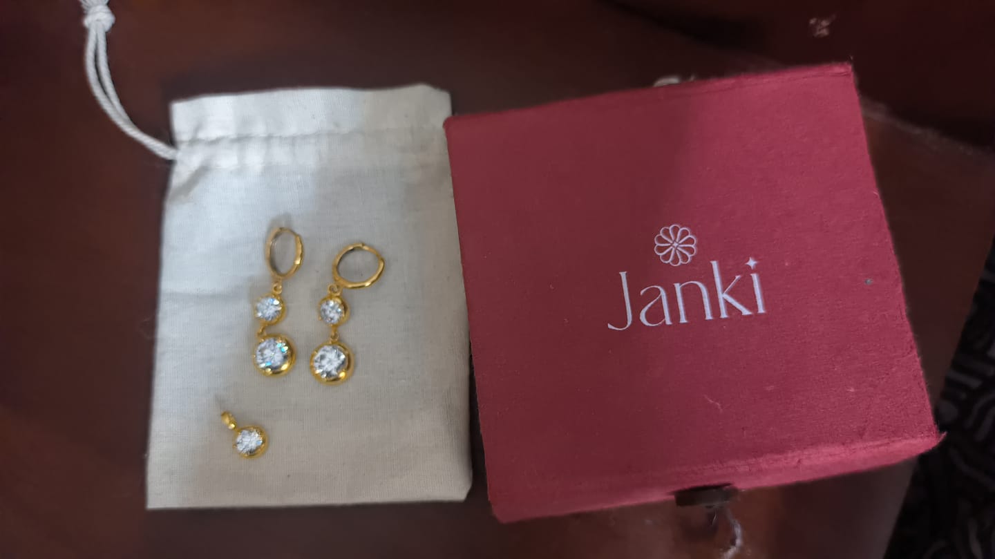 Customer photo review of Graduating Diamond Solitaire Earrings