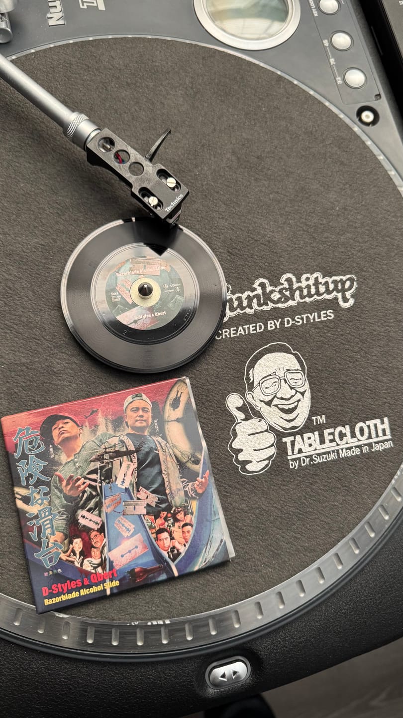 Customer photo review of D-Styles & Qbert: Razorblade Alcohol Slide (3-Inch Vinyl + Custom Slipmat)