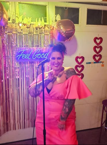 Customer photo review of BACKLOT NON DAMAGED - Bad Girl Babydoll Crop Top in Flamingo Pink Vegan Leather - Vixen by Micheline Pitt