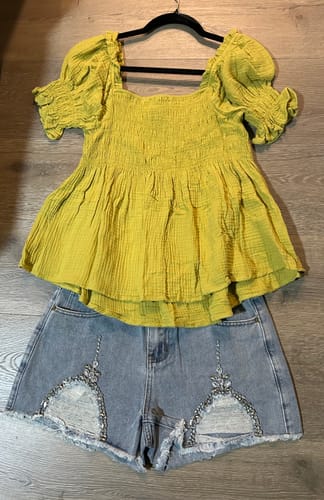 Customer photo review of WOMEN'S BUTTON CLOSURE POCKETS DISTRESS STUDS DENIM MINI SHORTS