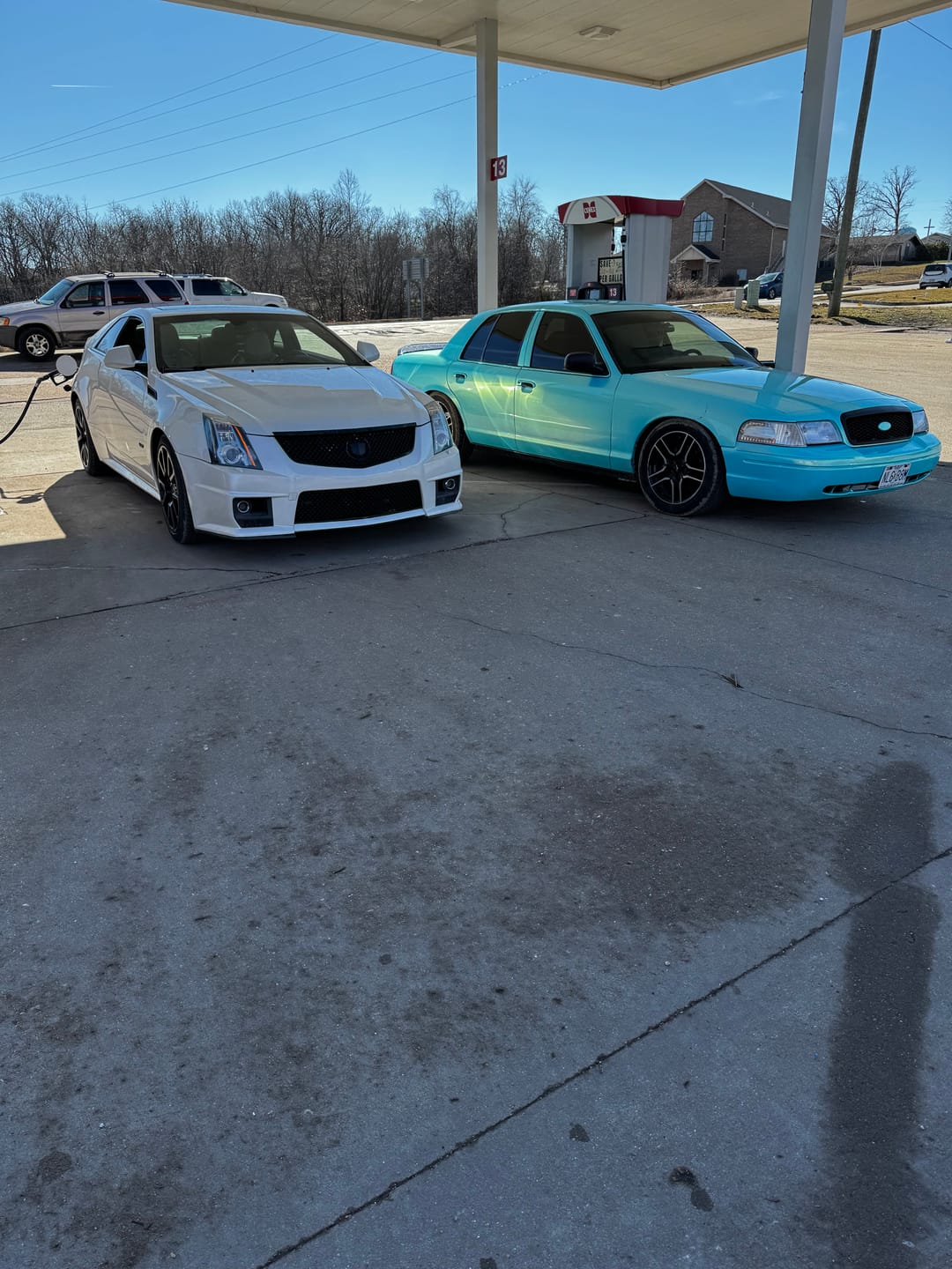 Customer photo review of Candy Metallic Neon Ice Blue Vinyl Wrap