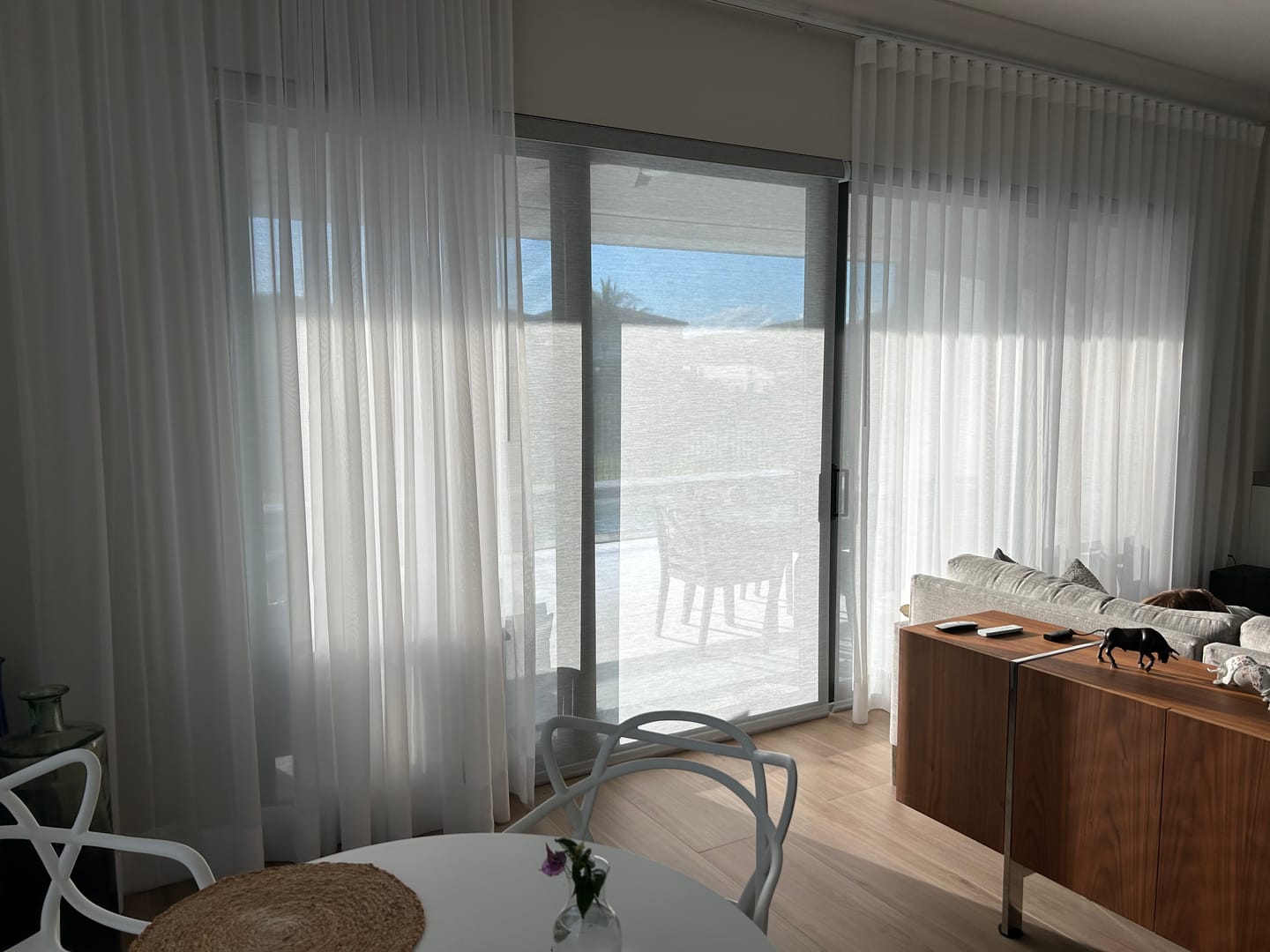 Customer photo review of SmartWings Motorized Light Filtering Roller Shades 50% Blackout PVC Free Sunscreen