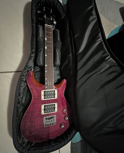 Customer photo review of VANGTTP Flight Vanguard Tenor Transparent Purple Steel String Solid Body Electric Ukulele with Deluxe 20mm padded gig bag.