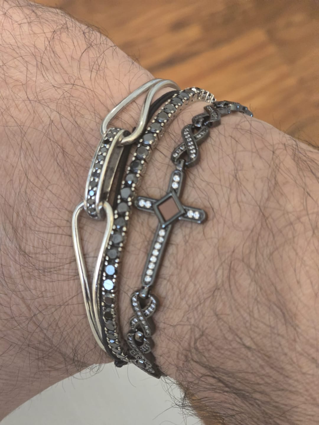 Customer photo review of Defender Cross Bracelet