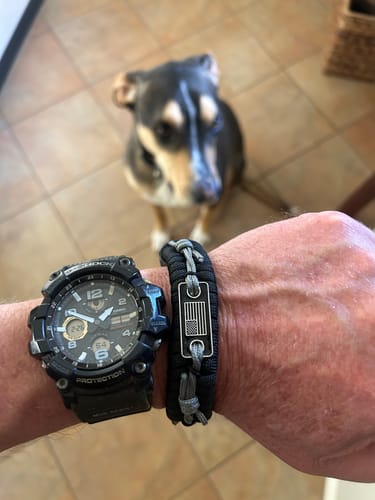 Customer photo review of Never Surrender Barbed Wire Paracord Bracelet: Helps Pair Veterans With A Service Dog Or Shelter Dog