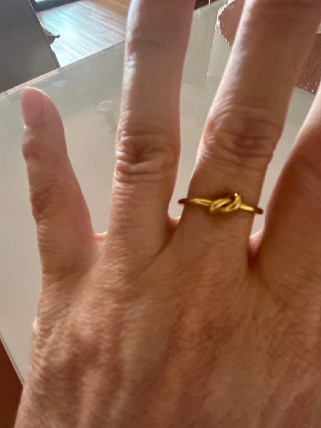 Customer photo review of Anel Nó Banhado em Ouro 18k