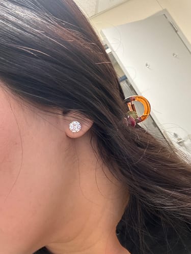 Customer photo review of M & Co. 4-Prong Martini Setting Diamond Stud Earrings