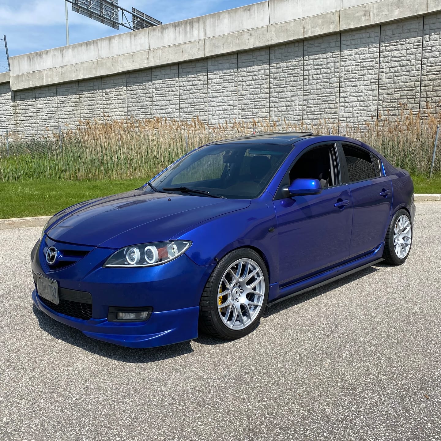 Customer photo review of Glossy Metallic Pearl Blue Vinyl Wrap