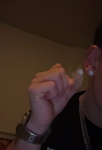 Customer photo review of MOISSANITE LOTUS FLOWER STUDS. - WHITE GOLD