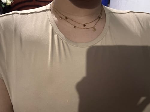 Customer photo review of Collar Doble Con Dijes Estrellas y Lunas