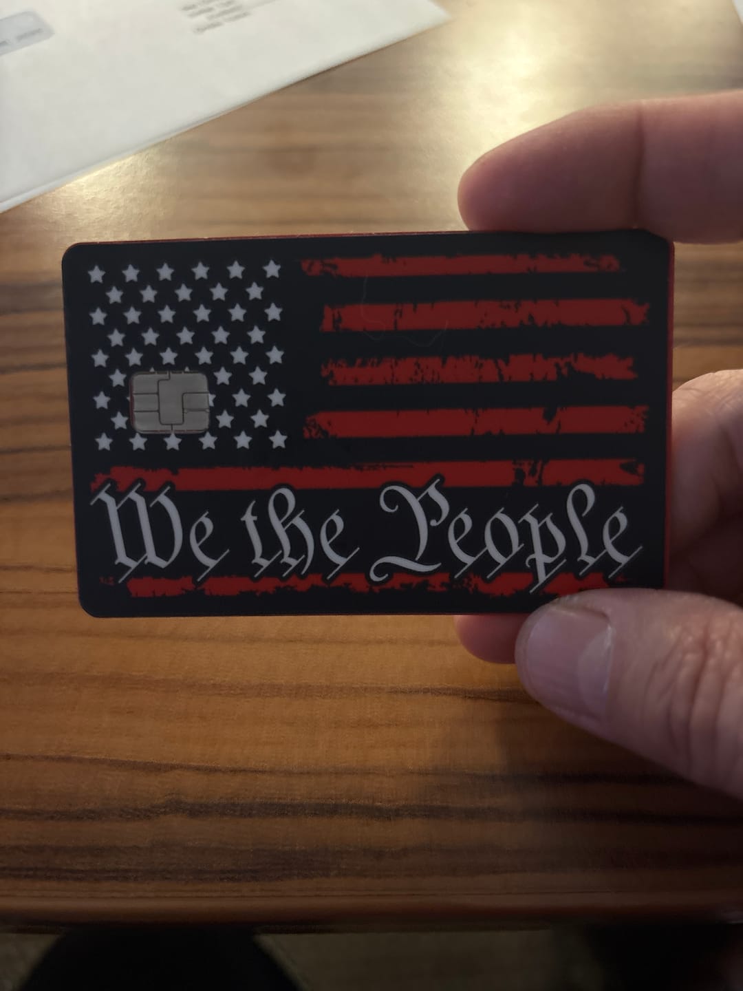 Customer photo review of We The People Flag Credit Card Skin Decal