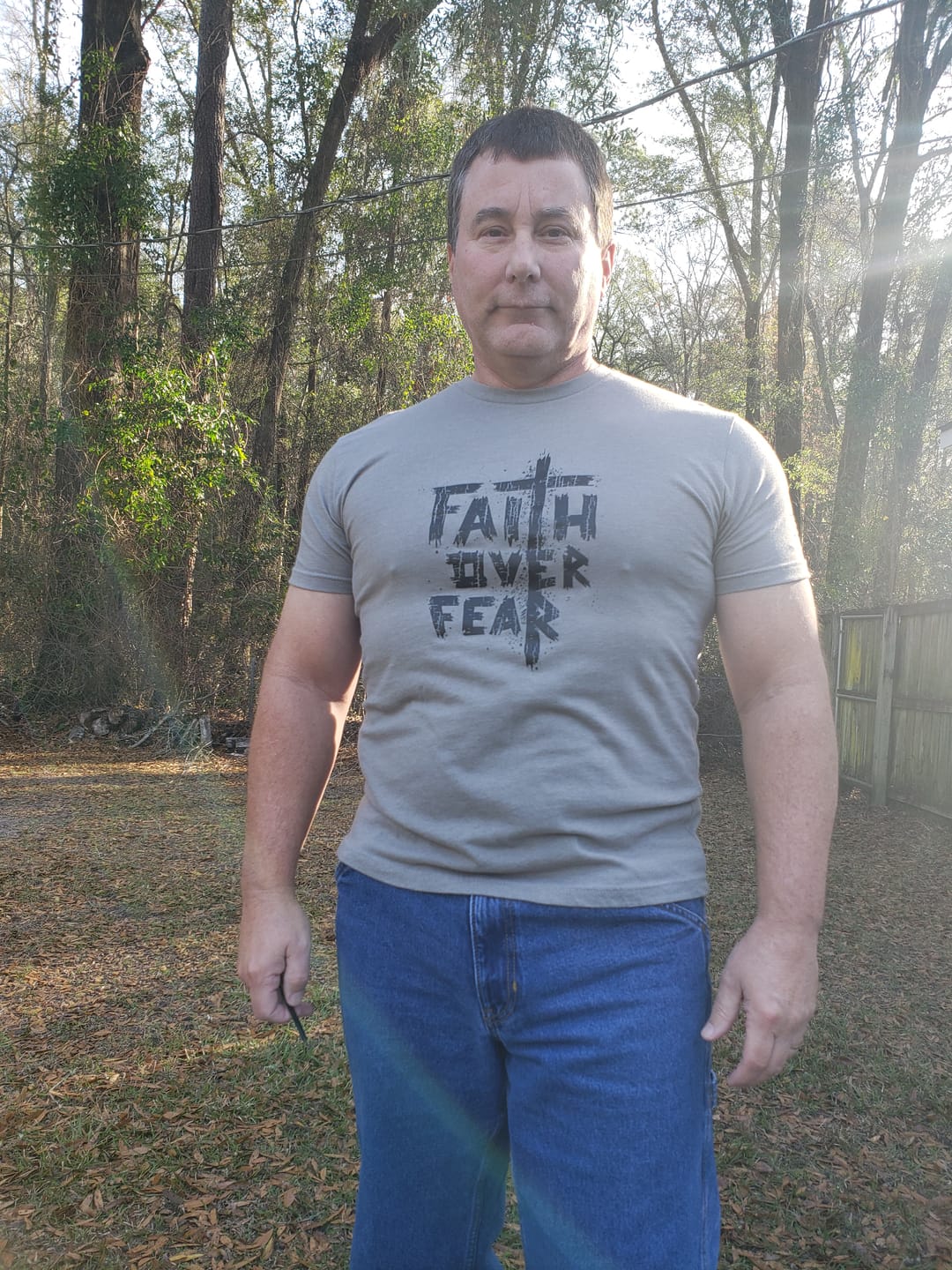 Customer photo review of Faith Over Fear Tee