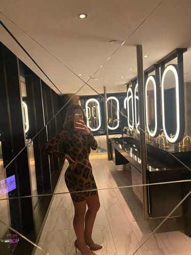 Customer photo review of Naked Animal Print Mini Dress