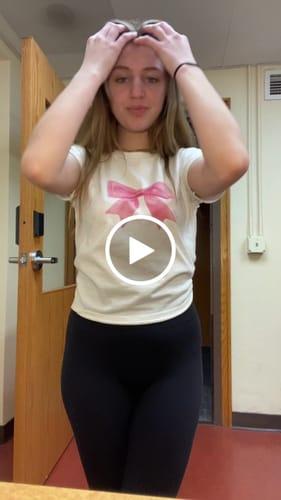 Customer video review of put a bow on it baby tee