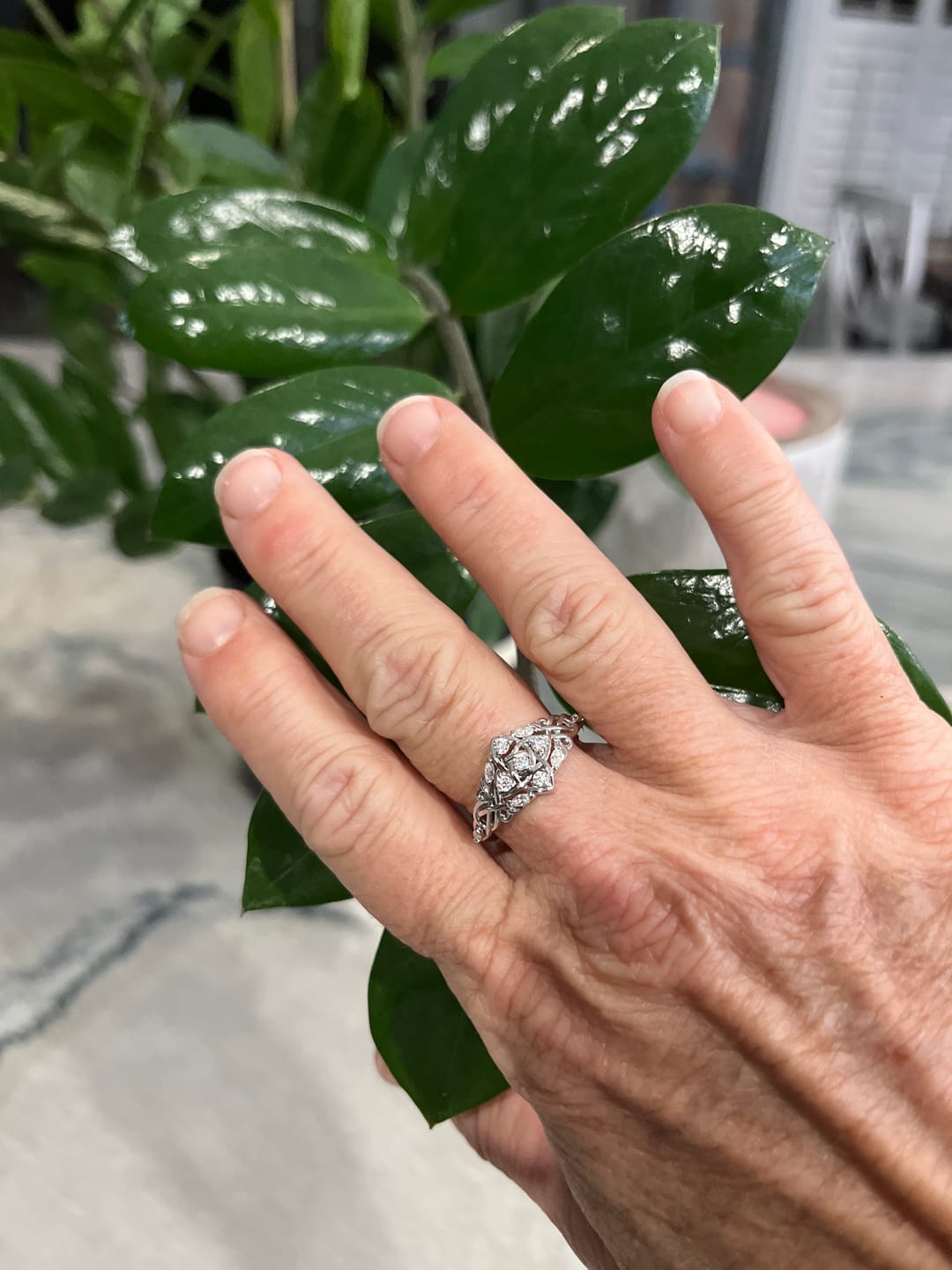 Customer photo review of Celtic Knot Moissanite Cluster Engagement Ring
