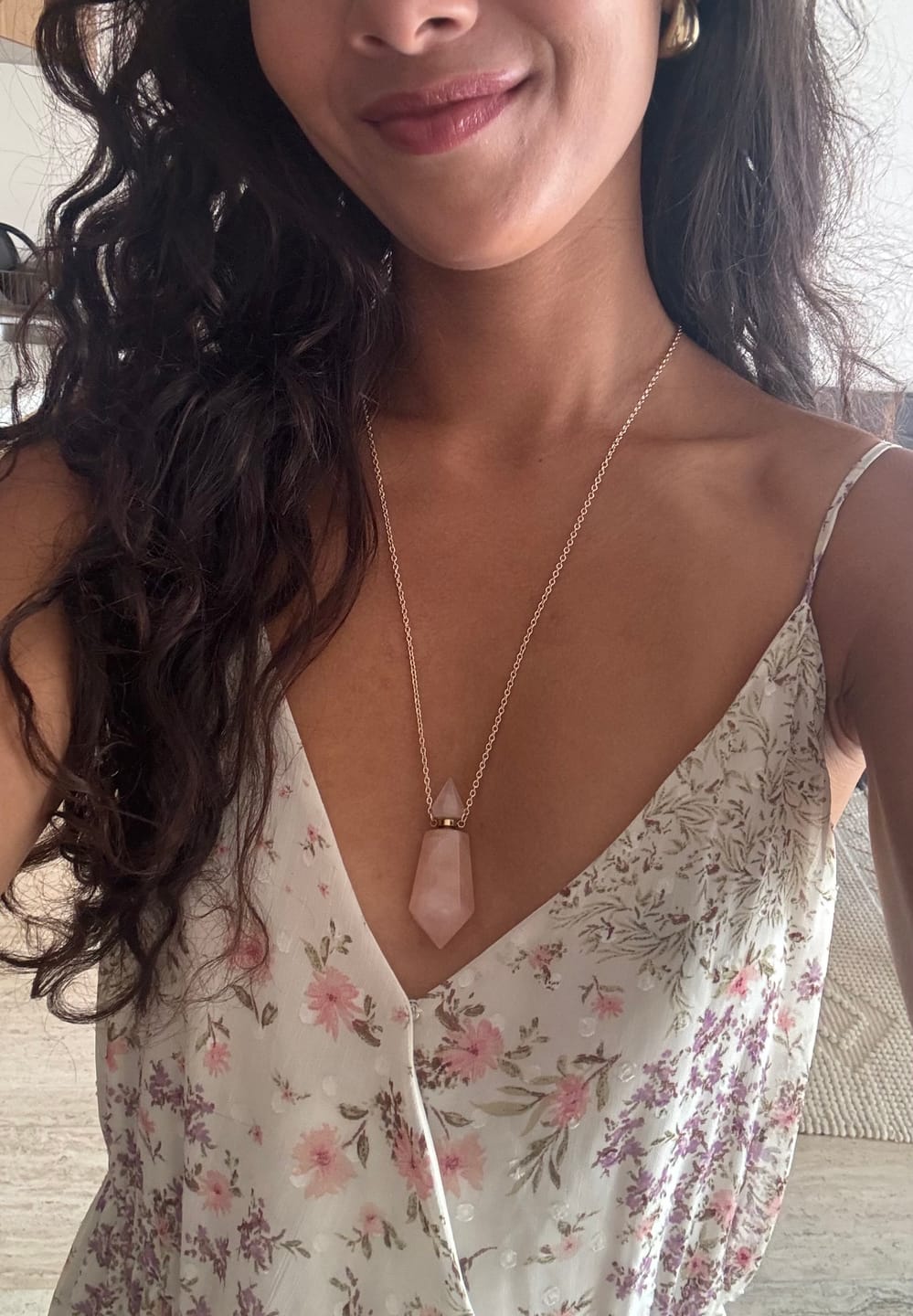 Customer photo review of Rose Quartz Sacred Lotus Essential Oil Nectar Necklace