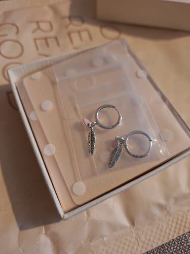 Customer photo review of "Feathers of Love" Earrings