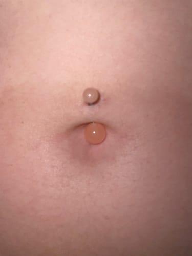 Customer photo review of GLOW in the Dark Belly Rings