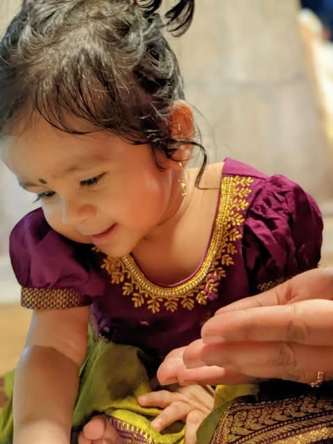 Customer photo review of Green and wine traditional langa blouse embroidered zari border dress for baby girl (100% Pure Cotton)