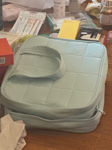 Customer photo review of Zora Spacesaver Hanging Toiletry Bag