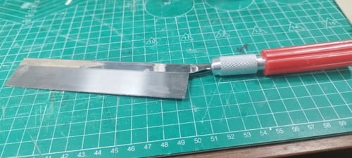 Reseña con foto de un cliente sobre Sierra 32 con mango GRATIS