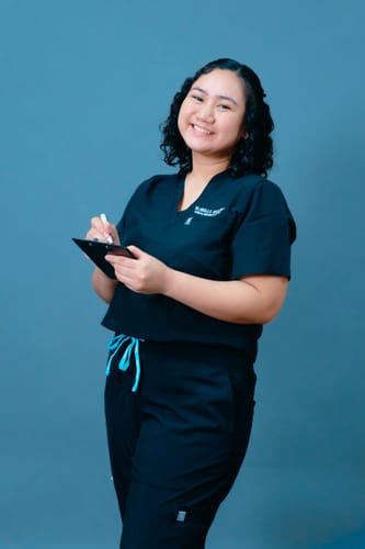 Customer photo review of 5-Pocket MoveTech® Scrub Top - Women / So Black