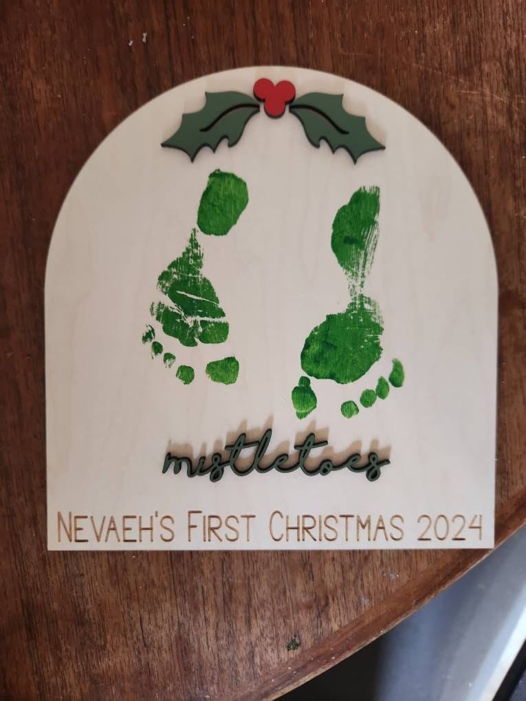Customer photo review of Baby's First Christmas Mistletoe Footprint Craft