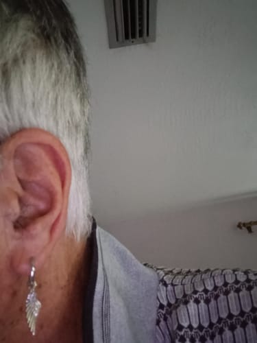 Customer photo review of The Hope® - 925 Sterling Silver Hoop Dangle Angel Wing Earrings